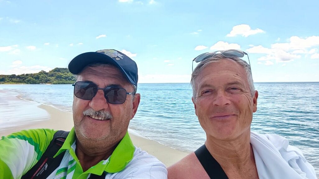 Anthony and a guest on the beach