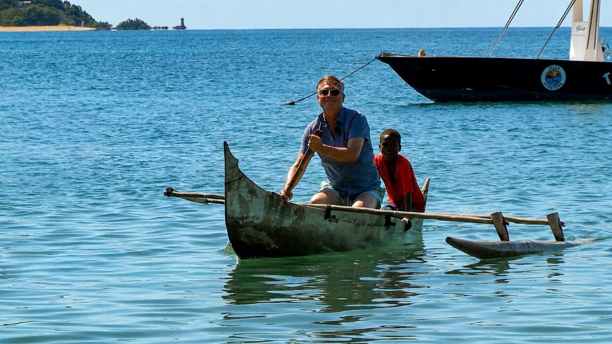 Anthony paddling a pirogue