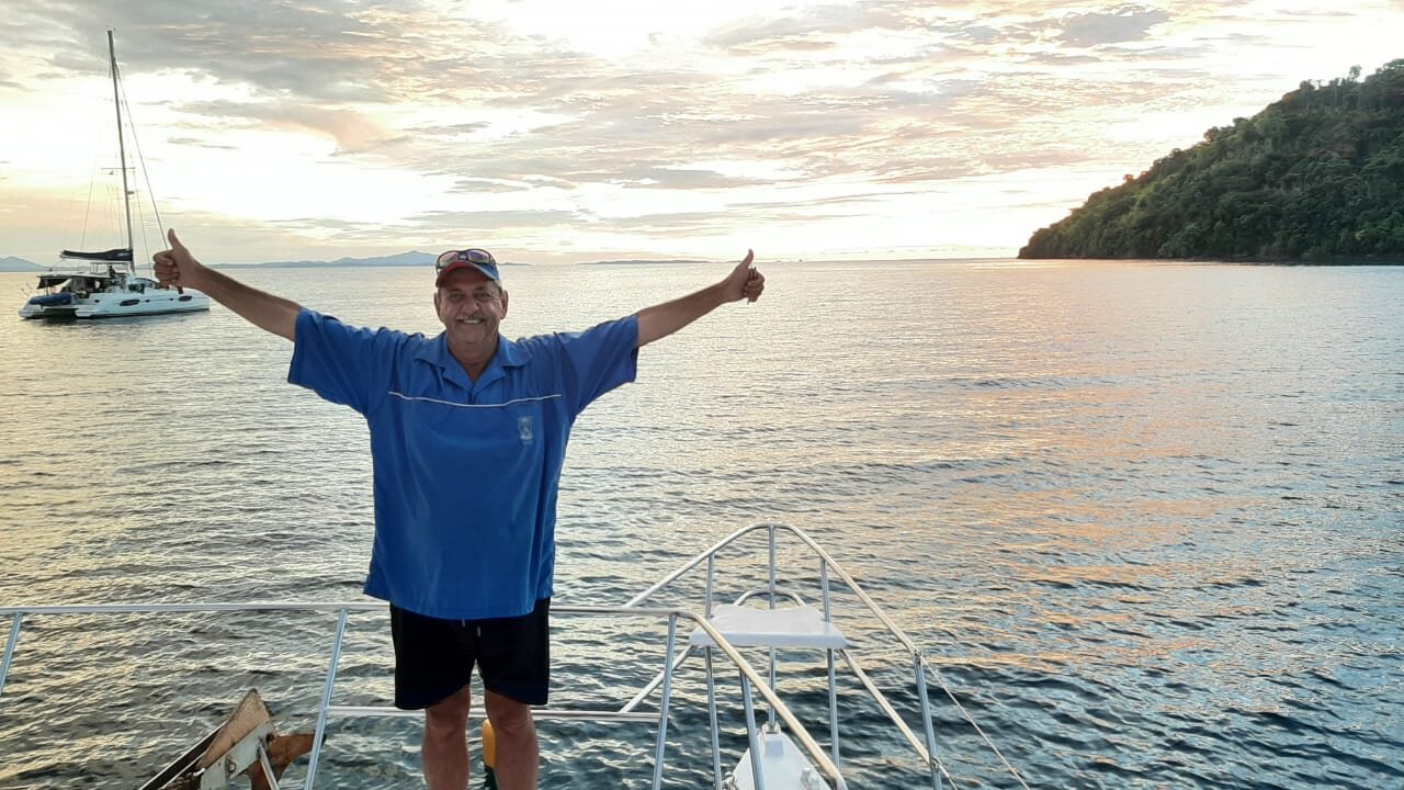 Anthony Schenk on the boat at sunset off Nosy Be
