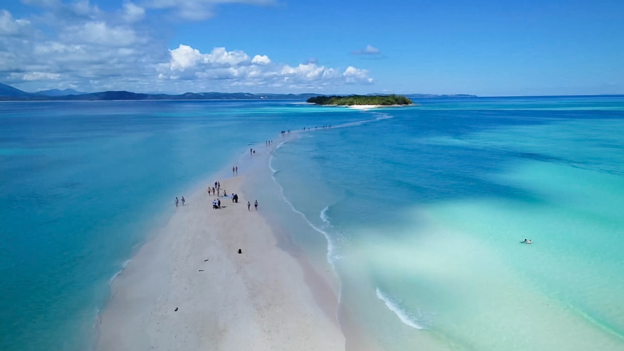 Sandbars that come and go with the tide.