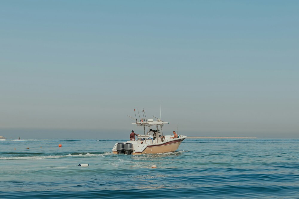 A sportfishing boat trolling offshore